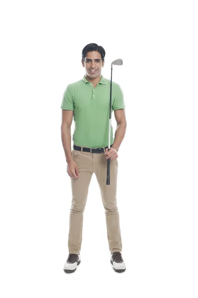 Male golfer holding a golf club — Stock Photo, Image