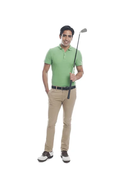 Male golfer holding a golf club — Stock Photo, Image