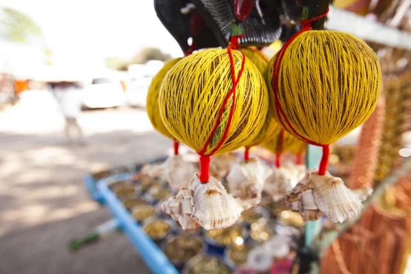 Coconuts tied up with threads — Stock Photo, Image