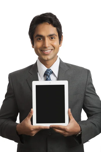 Businessman holding a digital tablet — Stock Photo, Image