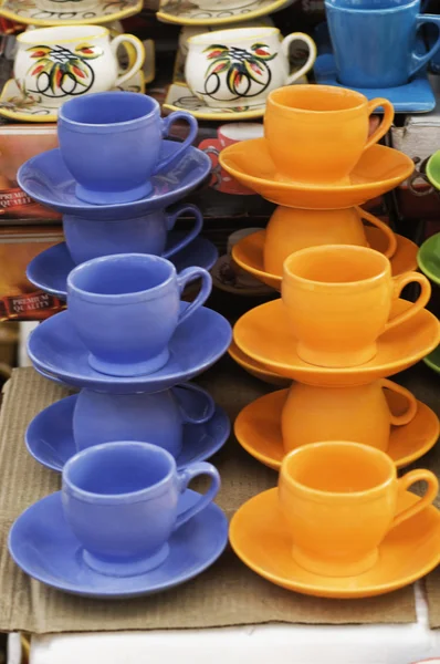 Display of tea cups with saucers