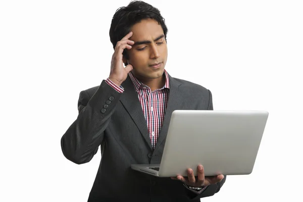 Businessman using a laptop — Stock Photo, Image