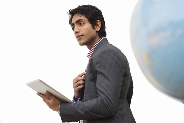 Businessman holding a digital tablet — Stock Photo, Image