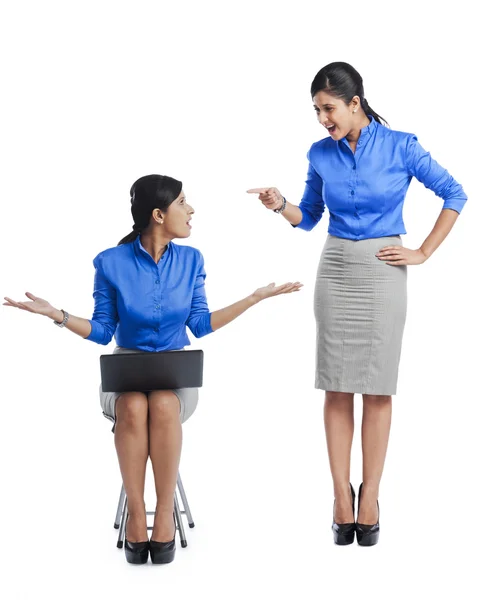 Businesswoman talking to her clone — Stock Photo, Image