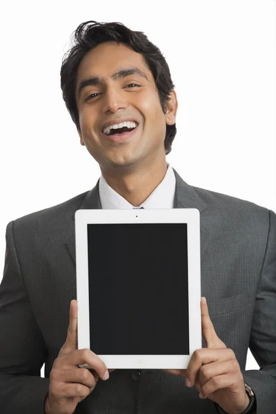 Businessman holding a digital tablet — Stock Photo, Image