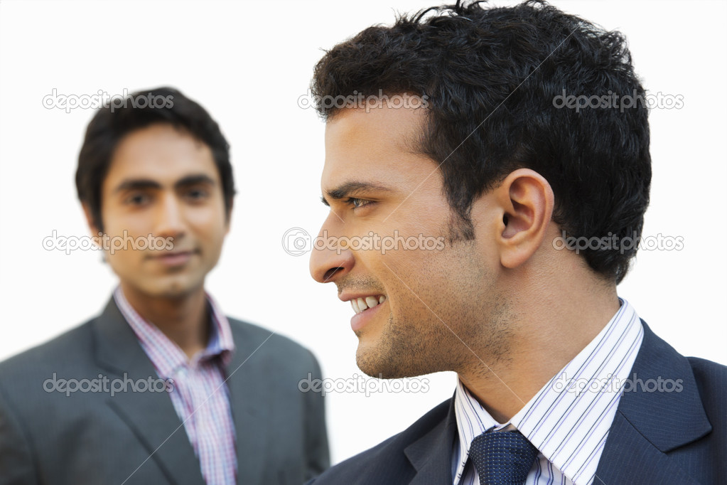 Businessman smiling with his colleague