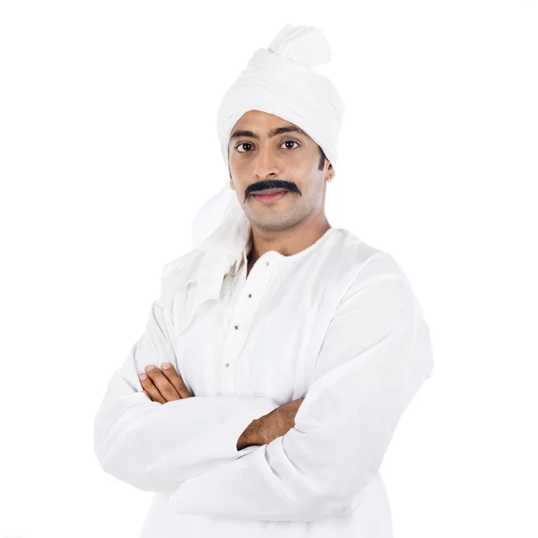 Portrait of a man standing with his arms crossed — Stock Photo, Image