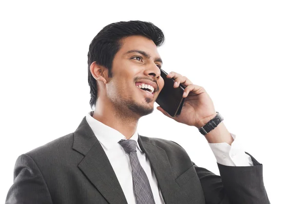 Empresário falando em um telefone celular — Fotografia de Stock