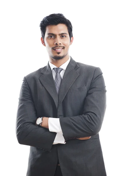 Portrait of a businessman standing with his arms crossed Stock Image
