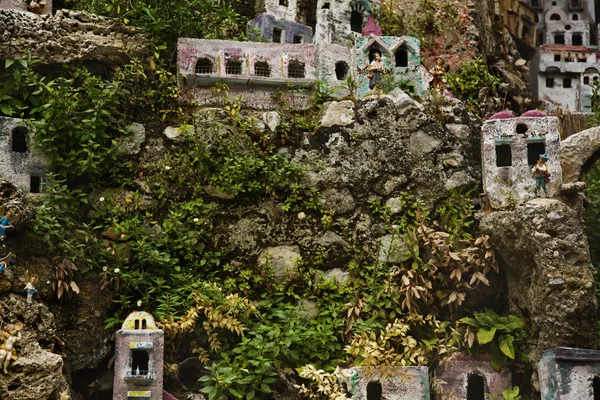 Miniature houses on the rocks — Stock Photo, Image