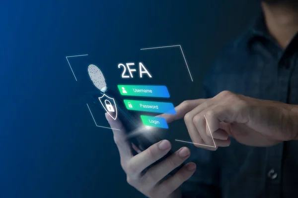 Businessman using smartphone to fingerprint scan for two-factor authentication for safety use of social networks and access to information privacy