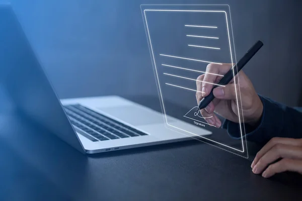 Businessman work from home handling documents E-signing, signing digital contracts electronic signing electronic signature through internet technology document data management smart contract agreement