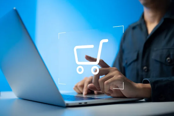 shopper using laptop and touch virtual screen online shopping. And online payment option or digital wallet online transaction concept.