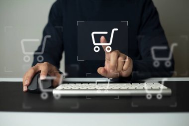 shopper using computer and touch virtual screen online shopping. And online payment option or digital wallet online transaction concept.