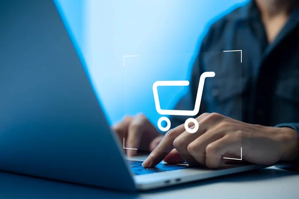 shopper using laptop and touch virtual screen online shopping. And online payment option or digital wallet online transaction concept.