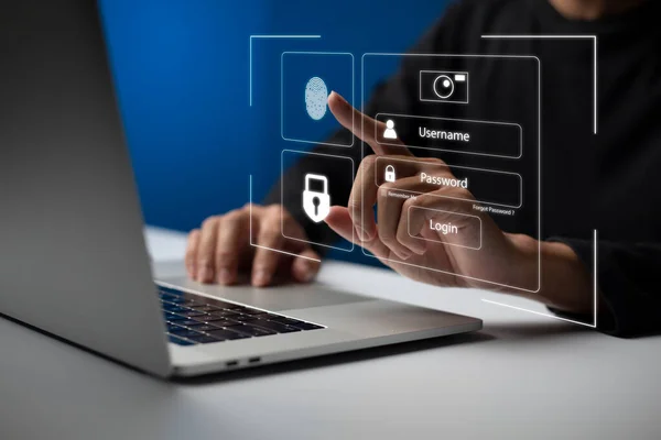 Person using laptop and touching virtual screen for two-factor authentication for safety use of social networks and access to information privacy