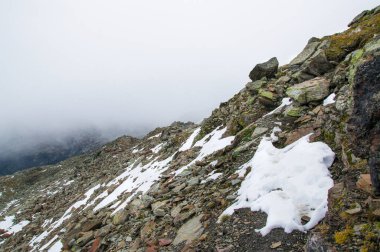 Mountain path on a hazy day in late summer.