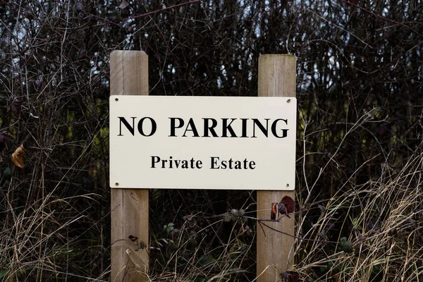 A sign warning the public that there is no parking due to the area being a private estate