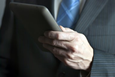 tablet bilgisayar işadamı tutar