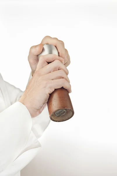 Chef Uses Pepper Mill, Side — Stock Photo, Image