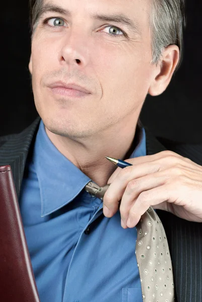 Stressed Businessman Adjusts Tie — Stock Photo, Image