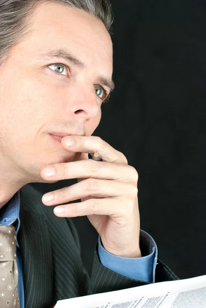 Thoughtful Businessman Looks Off Camera — Stock Photo, Image