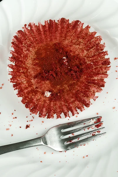 Empty Cupcake Wrapper, migas y un tenedor — Foto de Stock