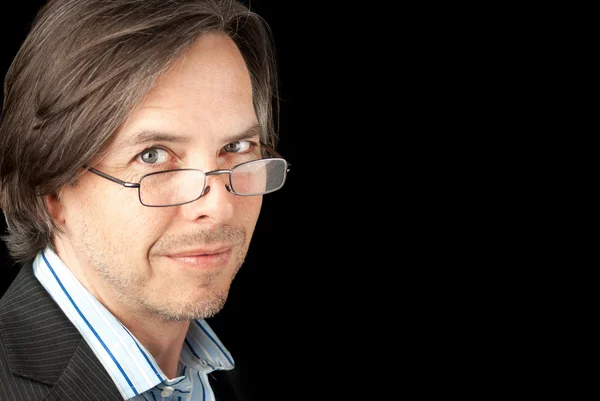 Casual Businessman Wearing Reading Glasses Looks To Camera — Stock Photo, Image