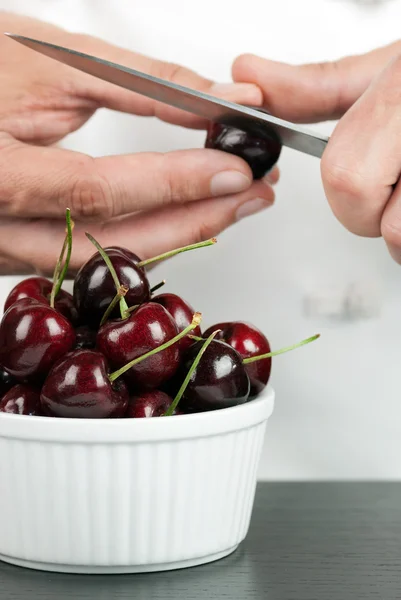 Chef Pitting Cherry — Stock Photo, Image