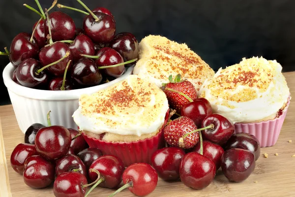 Iced Strawberry Cherry Muffins Surrounded With Fruit, Horizontal — Stock Photo, Image