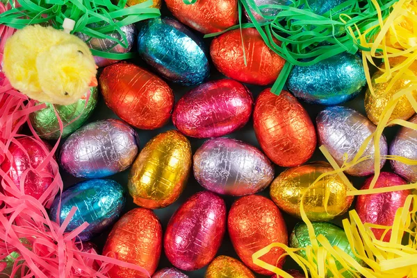 Colorful Easter Eggs and Grass with a Fluffy Chick Toy — Stock Photo, Image