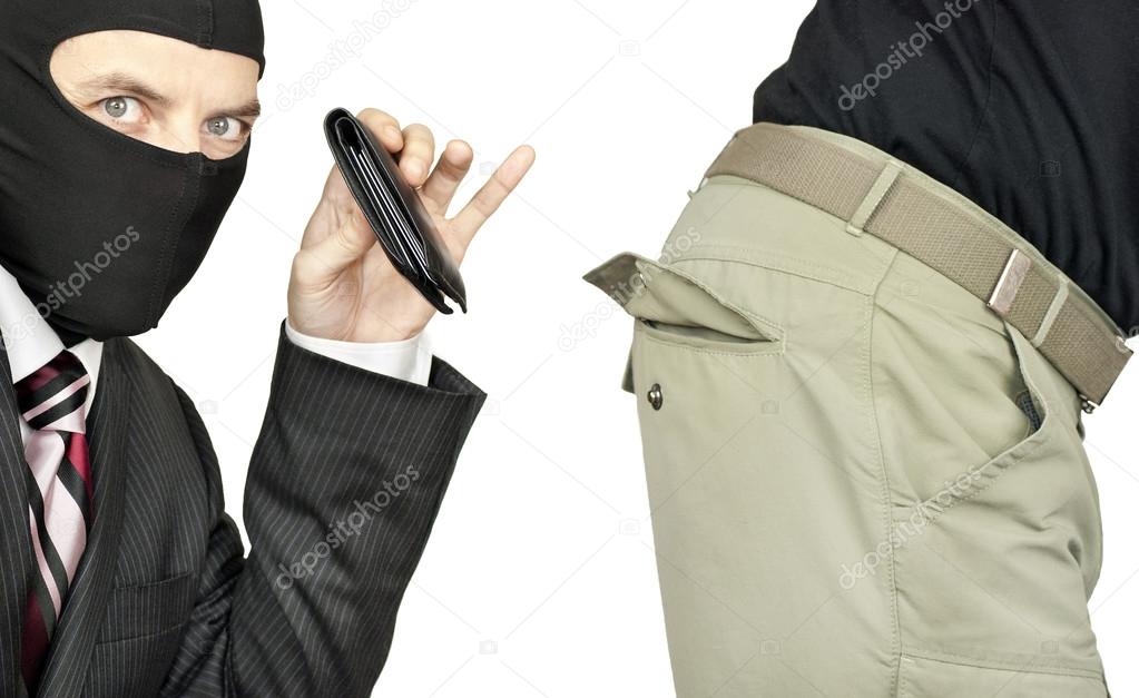 Businessman Picking Pocket Of Middle Class Man