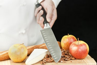 Şef bıçağı tutan
