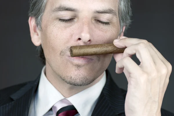 Businessman Smells Cigar — Stock Photo, Image