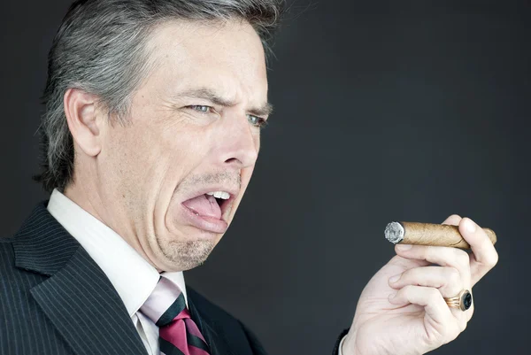 Businessman Looks At Cigar In Disgust — Stock Photo, Image