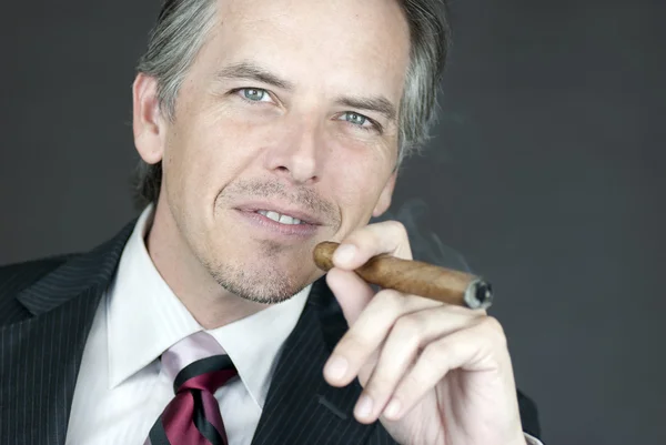 Successful Businessman Smokes Cigar — Stock Photo, Image