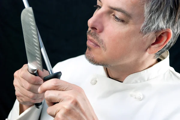 Chef Sharpens Knife — Stock Photo, Image