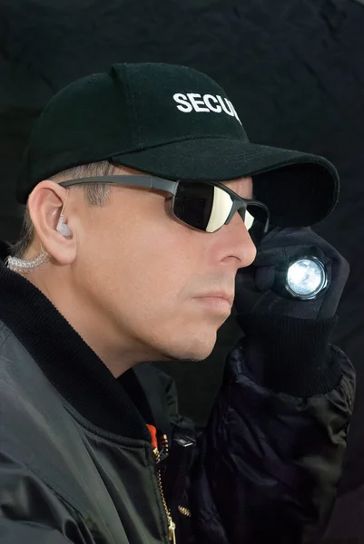 Security Guard Searches With Flashlight — Stock Photo, Image