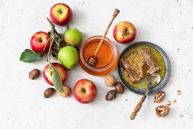 Honey, apple, honey comb , table set with traditional food for Jewish New Year Holiday, Rosh Hashana