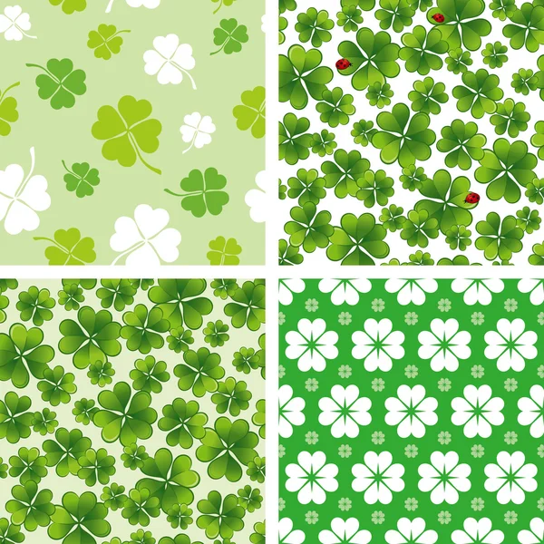 Set of seamless clover patterns — Stock Vector