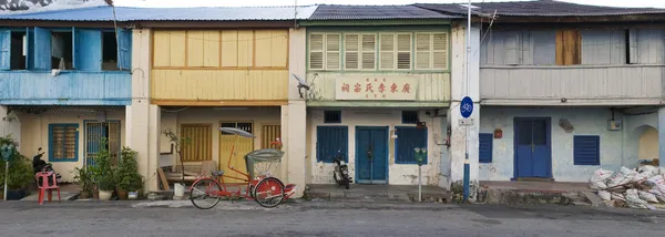 遗产房屋和三轮车，乔治城，槟城，马来西亚 图库图片