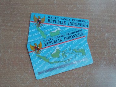 Two E-Ktp cards on the table. Medan, Indonesia - April 2, 2019 clipart