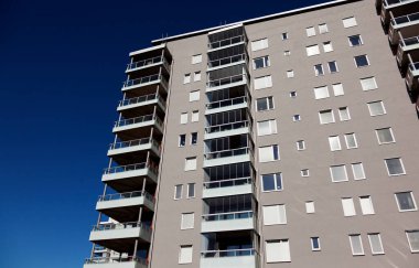 Umea, Norrland Sweden - July 18, 2022: newly painted high-rise buildings by the river
