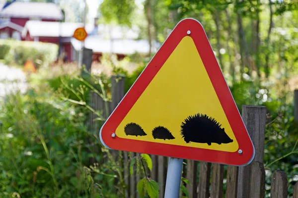 road sign warning of hedgehogs