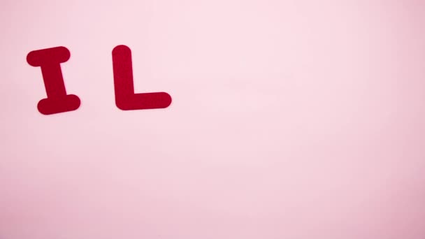 Red Letters Line Inscription Love You Pink Background Valentine Day — Vídeos de Stock