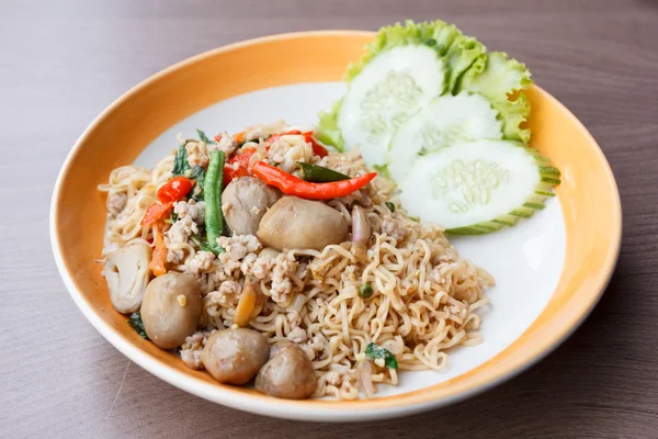 Stir fried  spicy  noodle with pork and straw mushroom — Stock Photo, Image