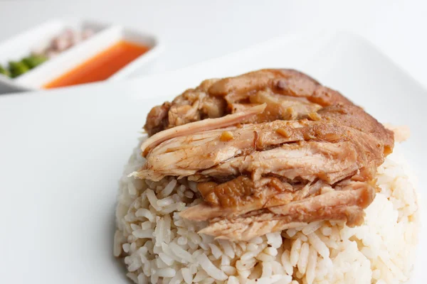 Pork leg with rice close up isolated on white background — Stock Photo, Image