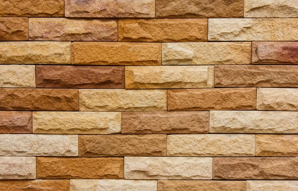 Gul brun tegel vägg bakgrund — Stockfoto