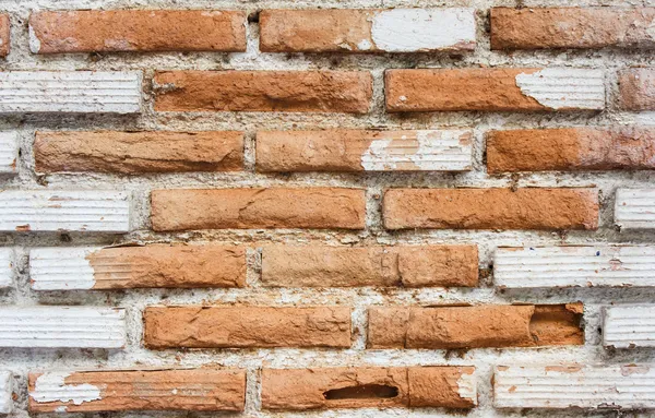 Bakgrund av vita spricka tegelvägg — Stockfoto