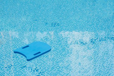KIck board in swimming pool clipart